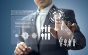 Ilustrasi Human Capital Management (HCM) mencakup rekrutmen, onboarding, pelatihan, manajemen kinerja, dan pengelolaan data karyawan.